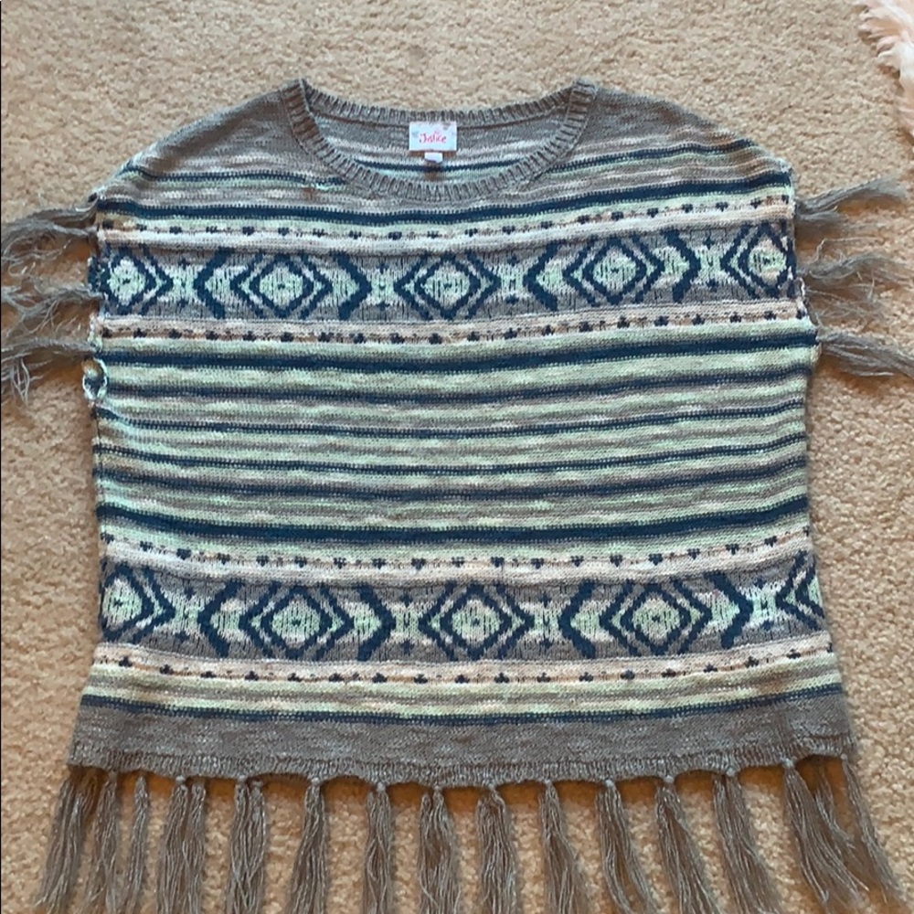 Loose fitting sweater, from justice size large.